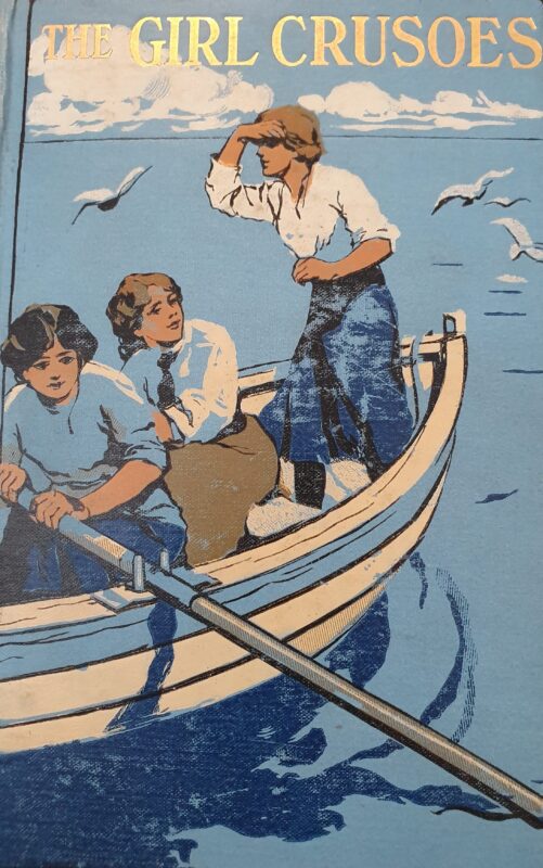 Cover of The Girl Crusoes (1912). It shows three teenage girls rowing a boat on the vast blue ocean.