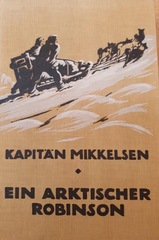 Cover of Ejnar Mikkselsen’s An Arctic Robinson, showing a black and white drawing on a beige background, in which two men are on a sleigh that is being pulled by dogs.