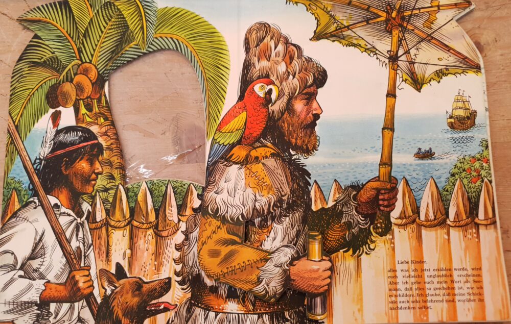 Double-page from pop-up book Robinson Crusoe, depicting Crusoe, Friday, a dog and a parrot.